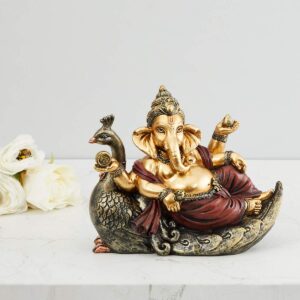 Home Centre Polyresin Ganesha Figurine with Peacock Stand
