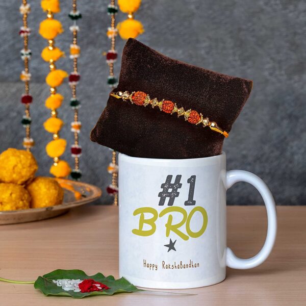 Roll over image to zoom in       TIED RIBBONS Rakhi for Brother with Gift Combo - Designer Rakhi with Rakshabandhan Special Coffee Mug, Mini Wishes Card and Roli Chawal, Multicolor, Medium - Image 2